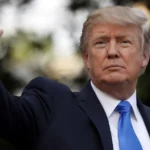 U.S. President Donald Trump talks to members of the press en route to Florida, U.S., November 14, 2025. REUTERS/Annabelle Gordon REUTERS